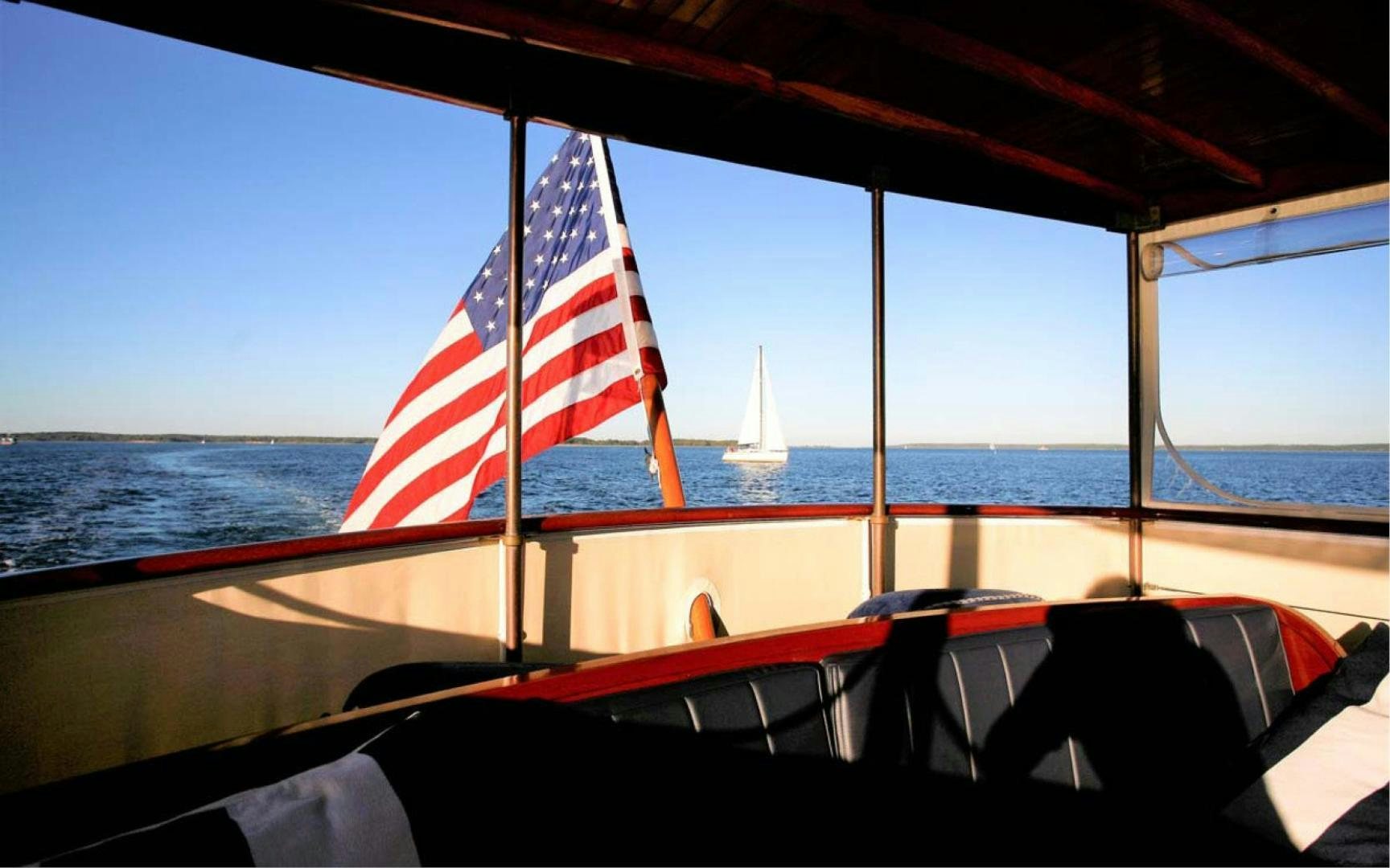 a flag on a boat aboard SCOUT Yacht for Sale