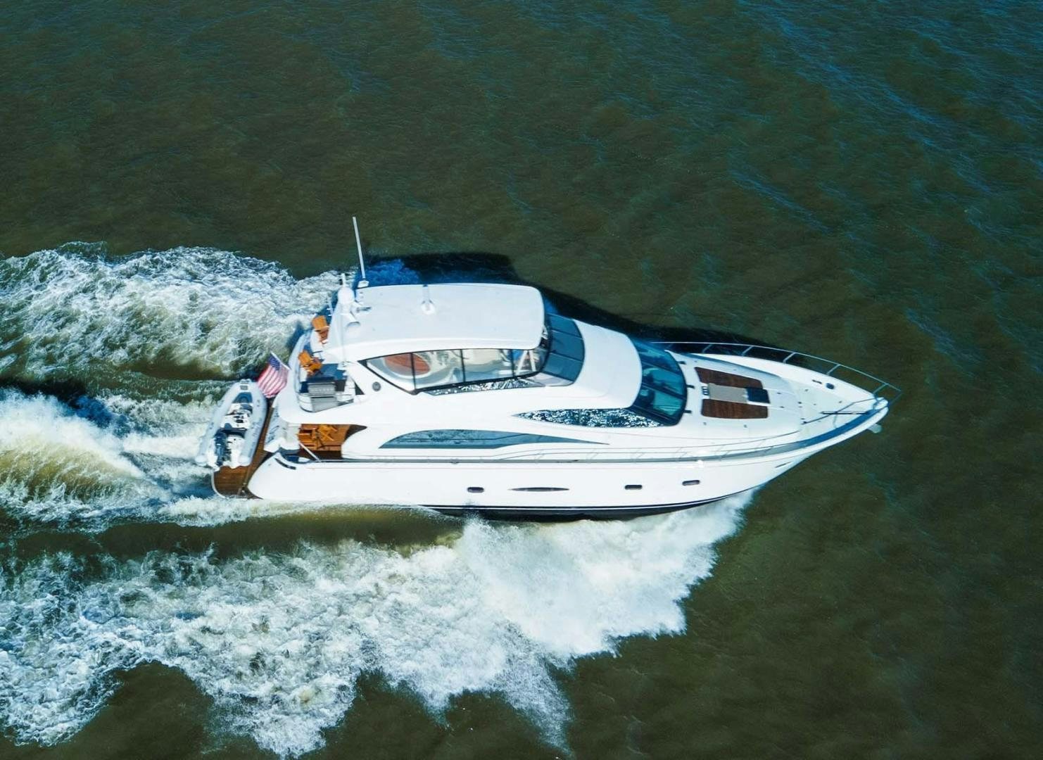 a boat on the water aboard DECKED OUT Yacht for Sale