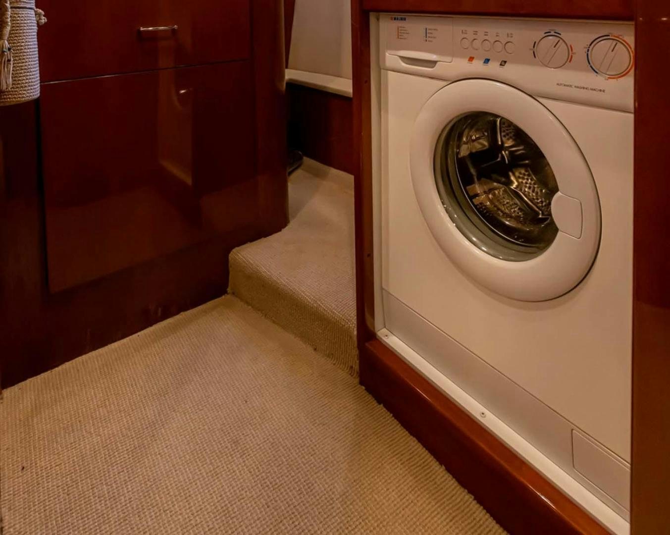 a washing machine and a washer aboard DECKED OUT Yacht for Sale