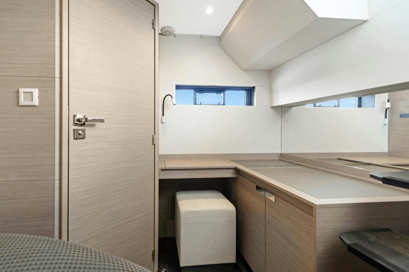 a bathroom with a shower and a toilet aboard Ocean Seven Yacht for Sale