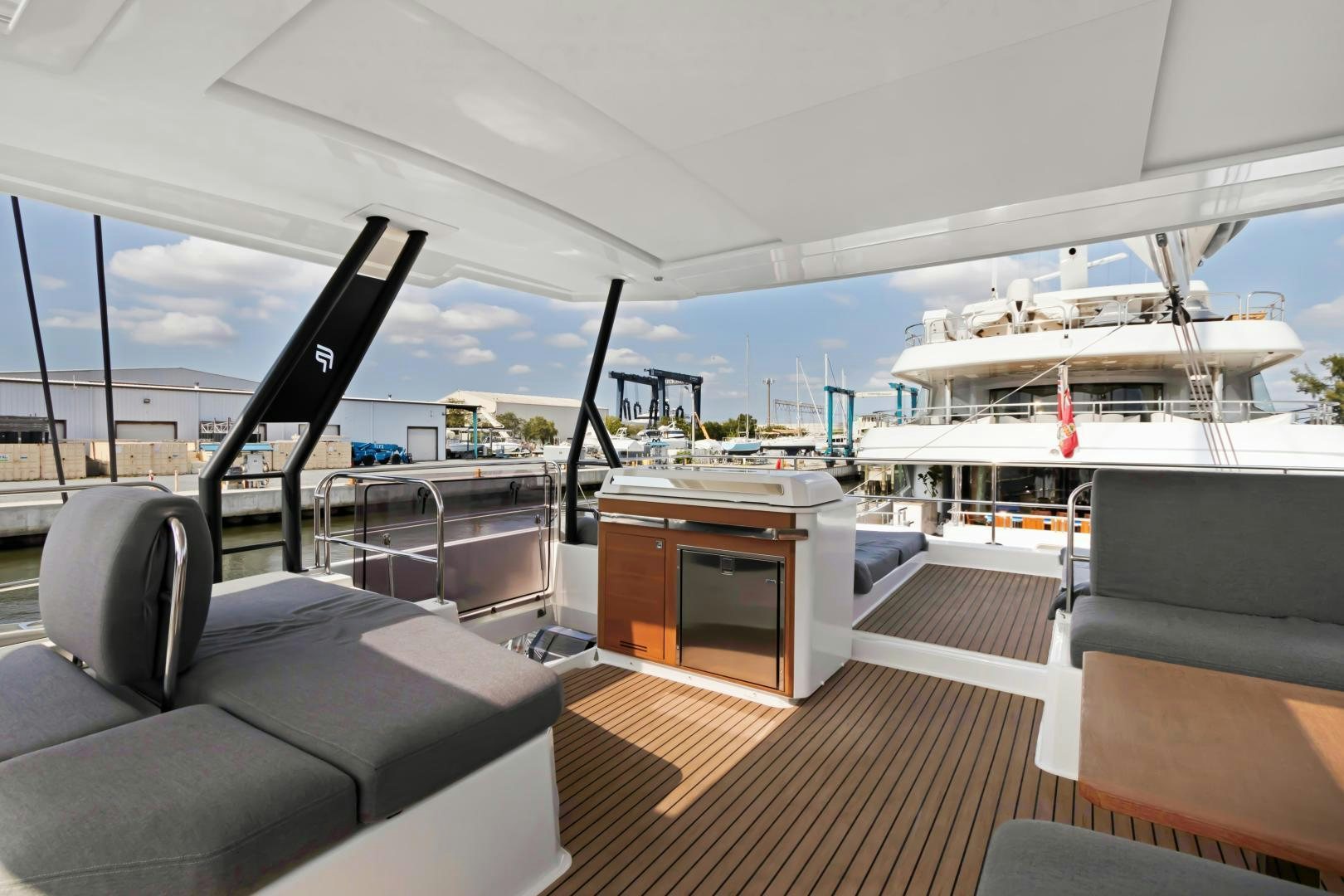 a boat on a deck aboard Ocean Seven Yacht for Sale