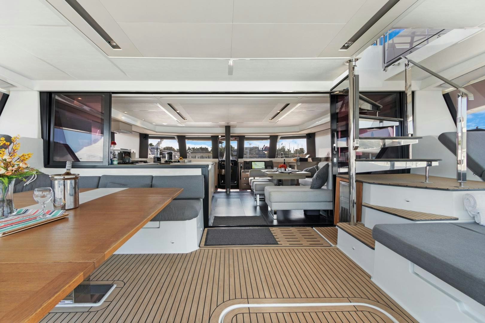 a room with a wood floor and a wood floor aboard Ocean Seven Yacht for Sale