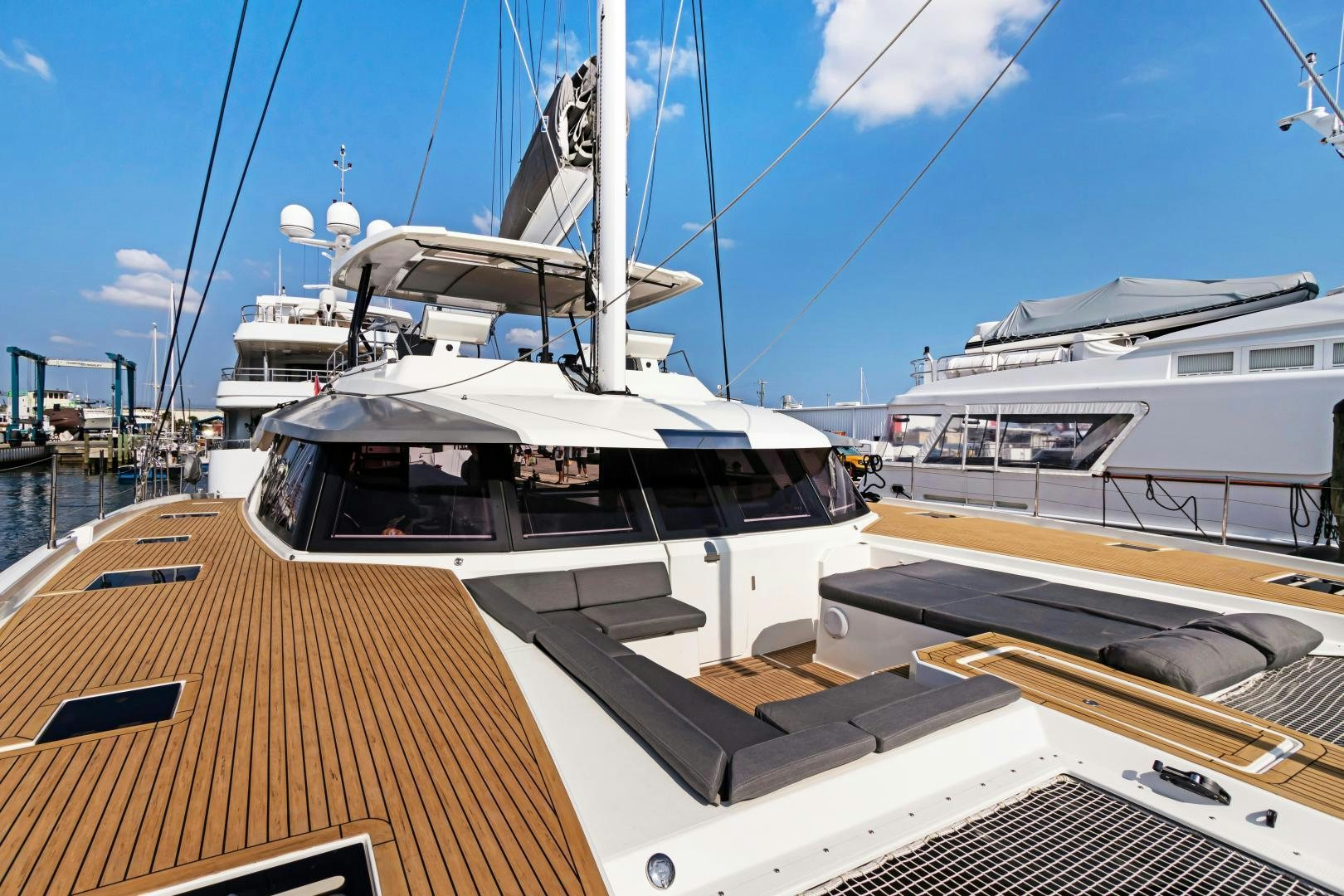 a boat docked at a pier aboard Ocean Seven Yacht for Sale
