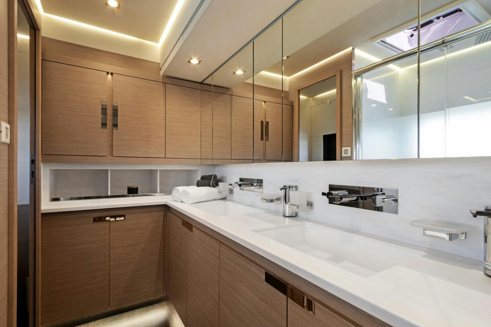 a kitchen with a sink and cabinets aboard Ocean Seven Yacht for Sale