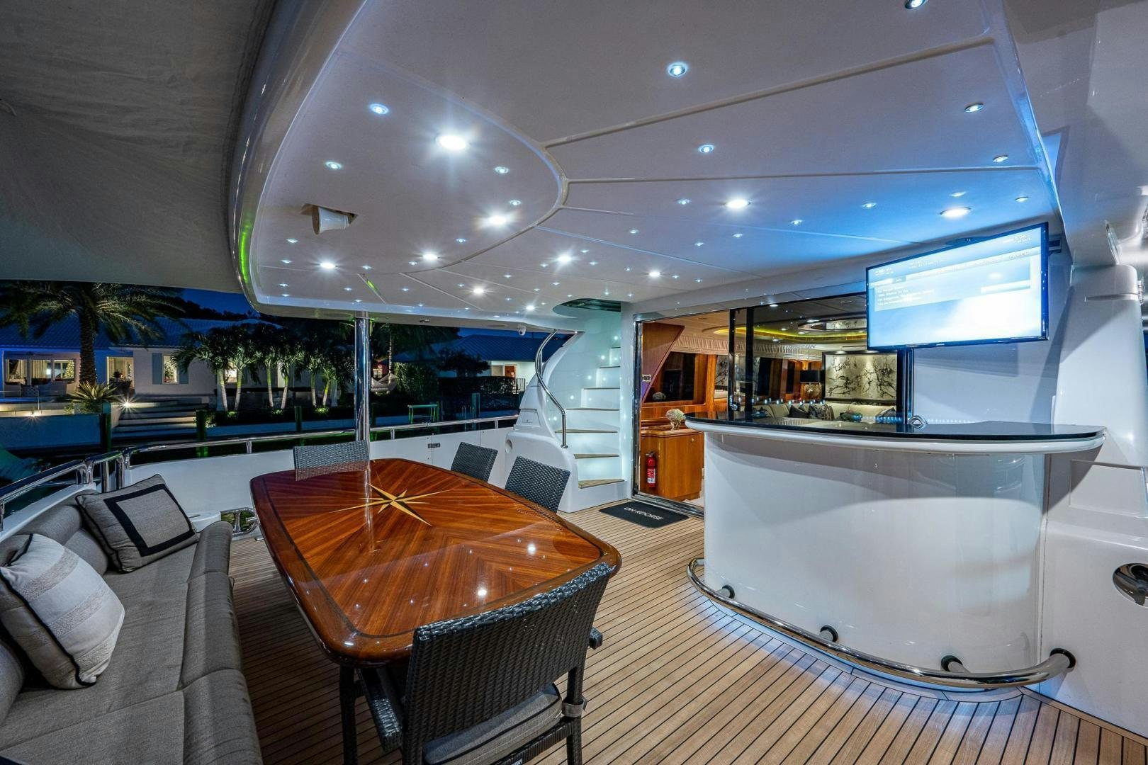 a large room with a table and chairs aboard ODYSSEY Yacht for Sale