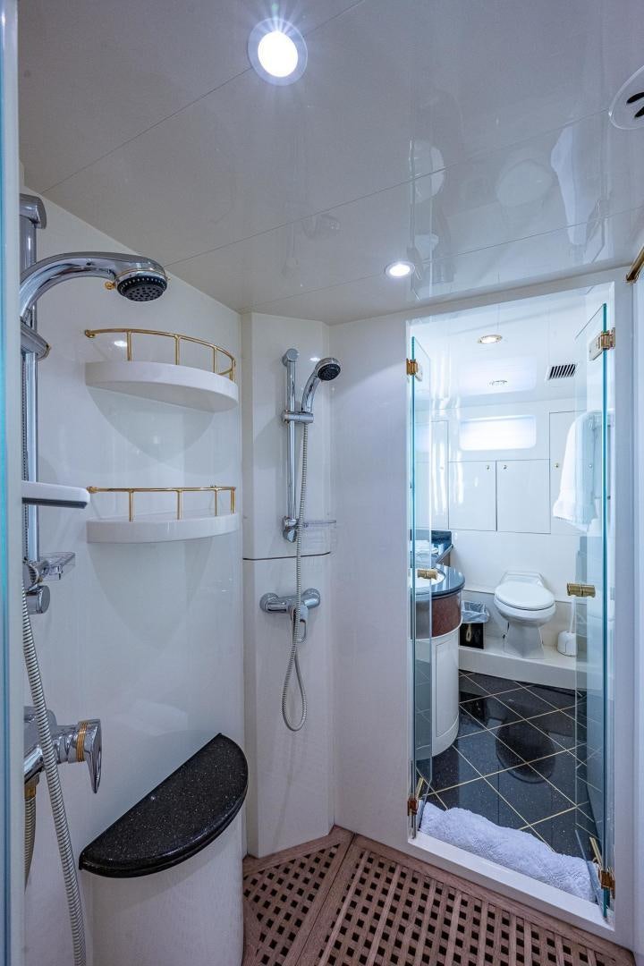 a bathroom with a sink and toilet aboard ODYSSEY Yacht for Sale