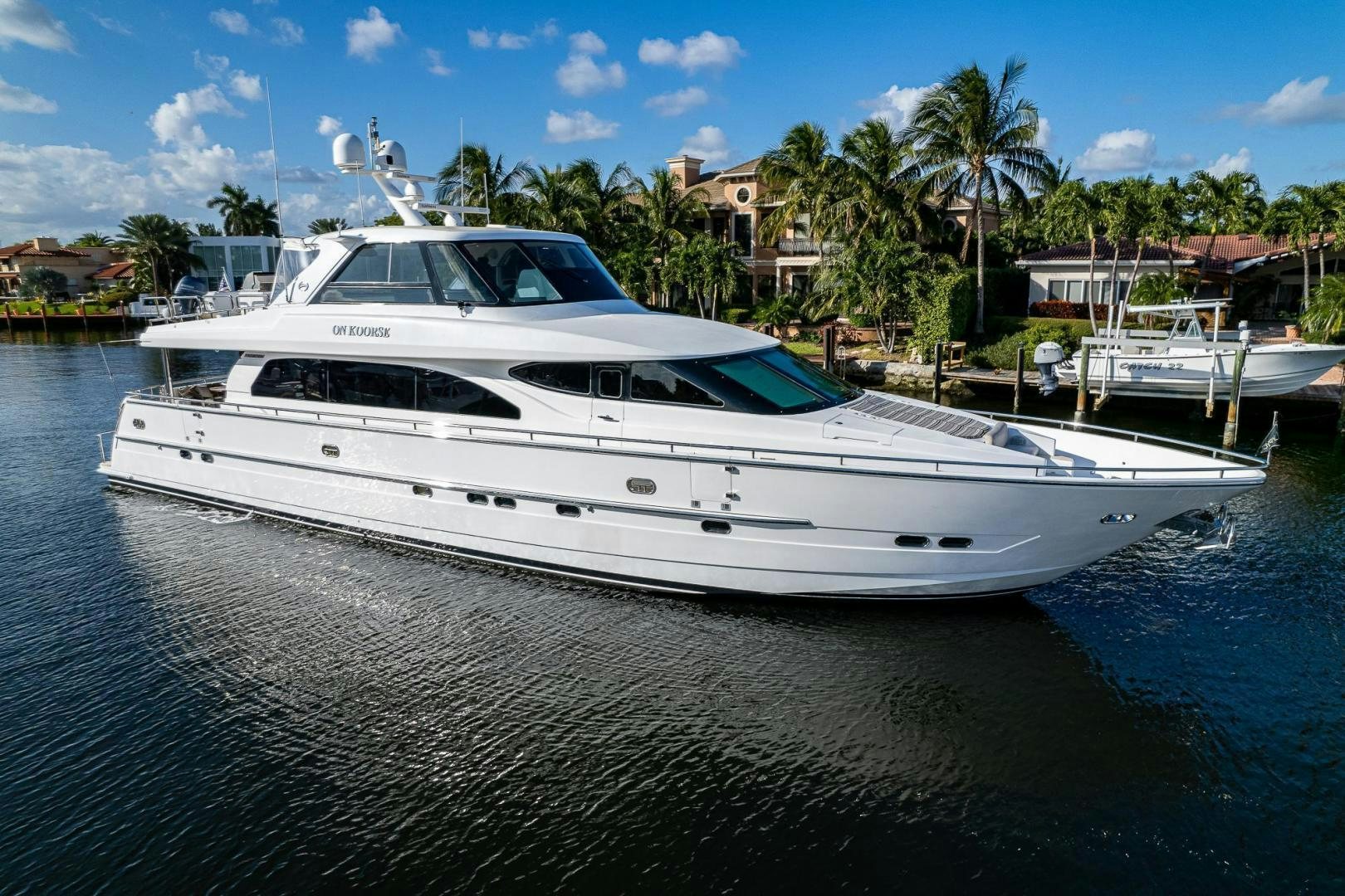 a white yacht in the water aboard ODYSSEY Yacht for Sale