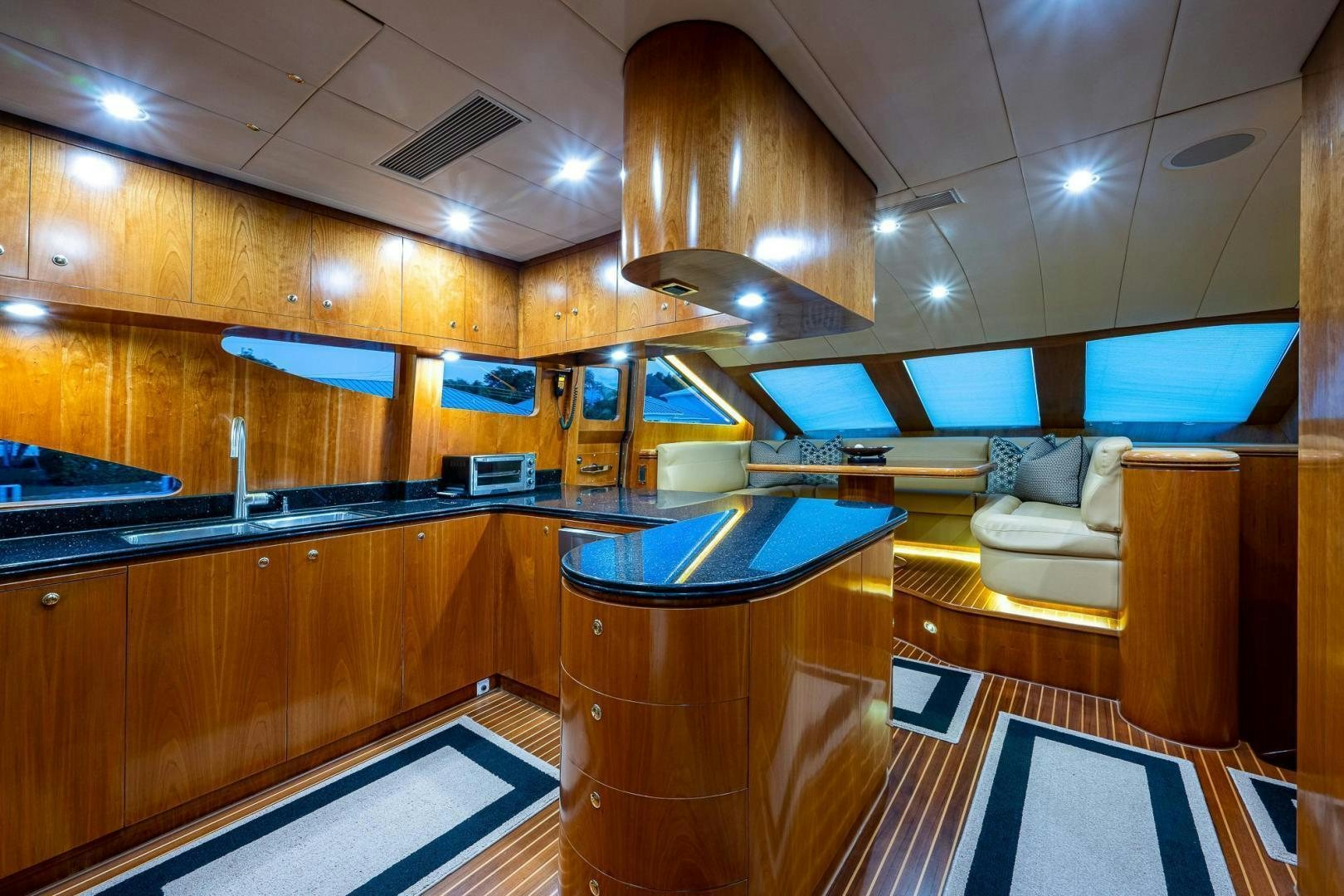 a kitchen with a bar and a bar aboard ODYSSEY Yacht for Sale
