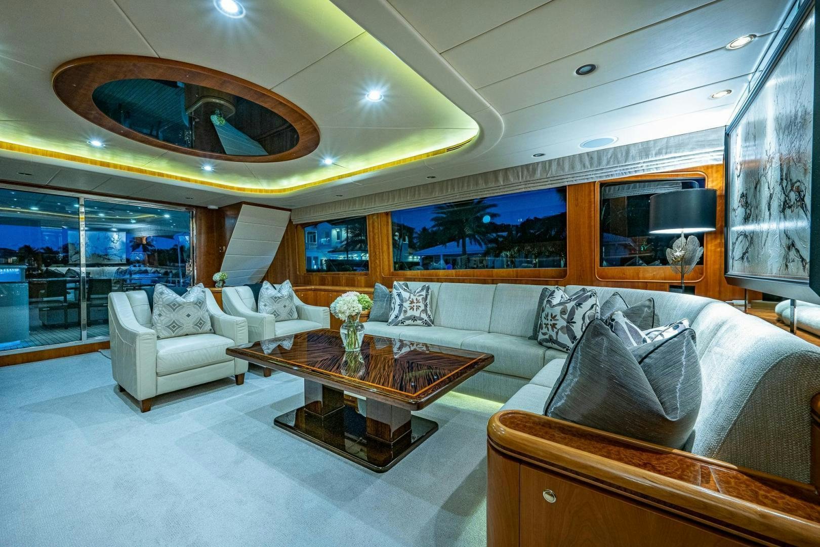 a living room with a large mirror aboard ODYSSEY Yacht for Sale