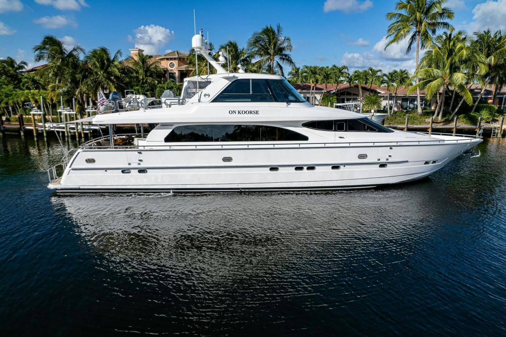 a white yacht on the water aboard ODYSSEY Yacht for Sale