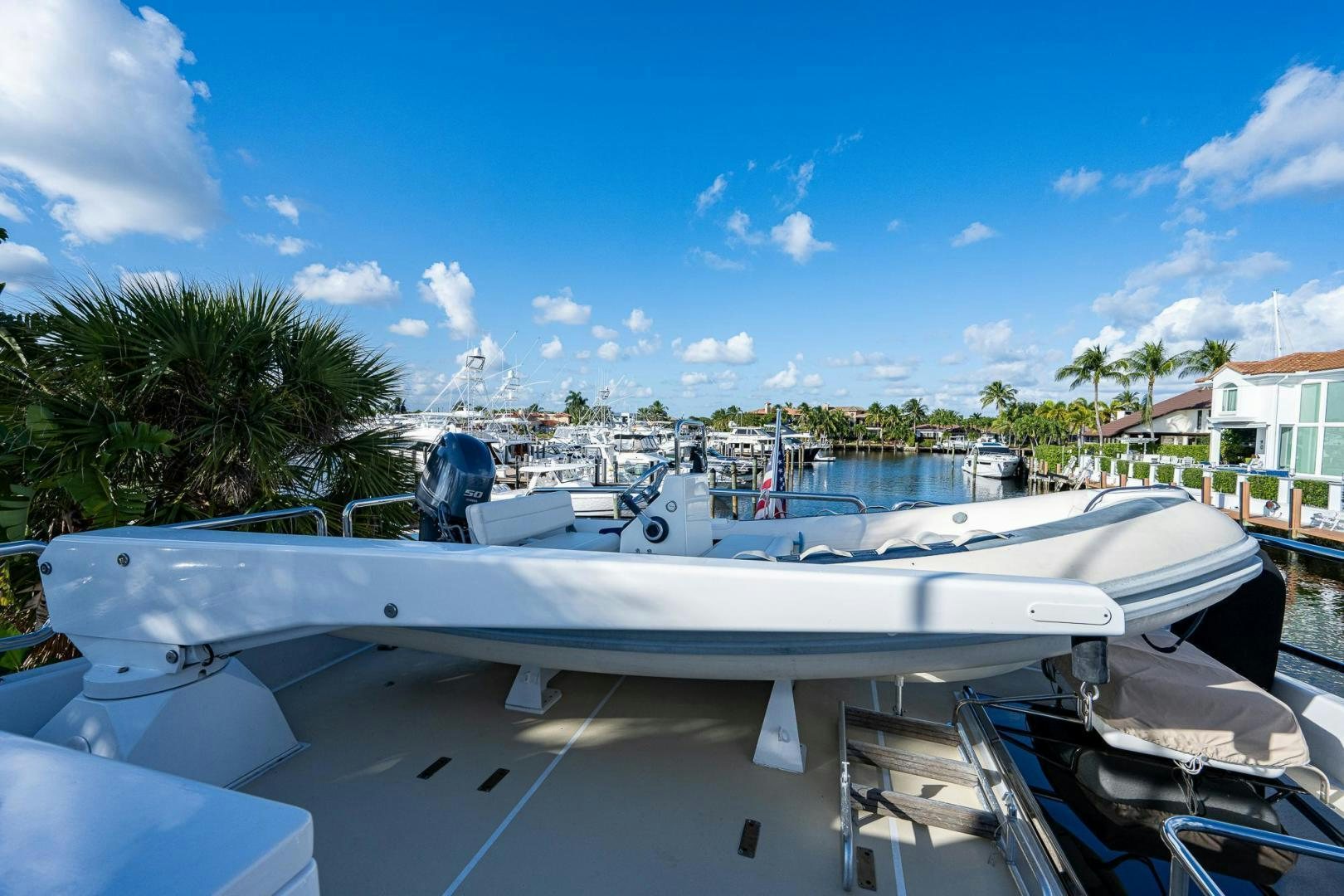 a boat parked on the side of a road aboard ODYSSEY Yacht for Sale
