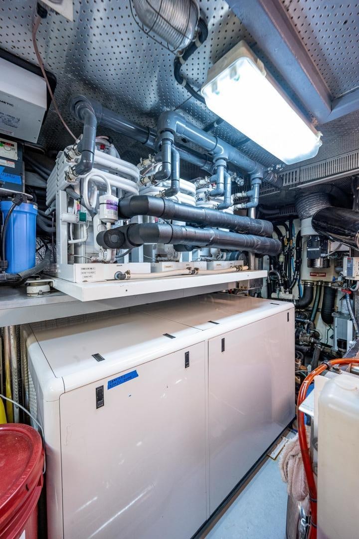 a machine with a large metal object on top aboard ODYSSEY Yacht for Sale