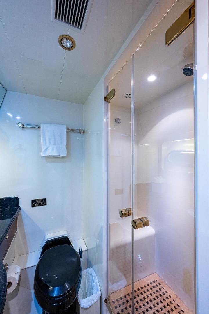 a shower with a glass door aboard ODYSSEY Yacht for Sale