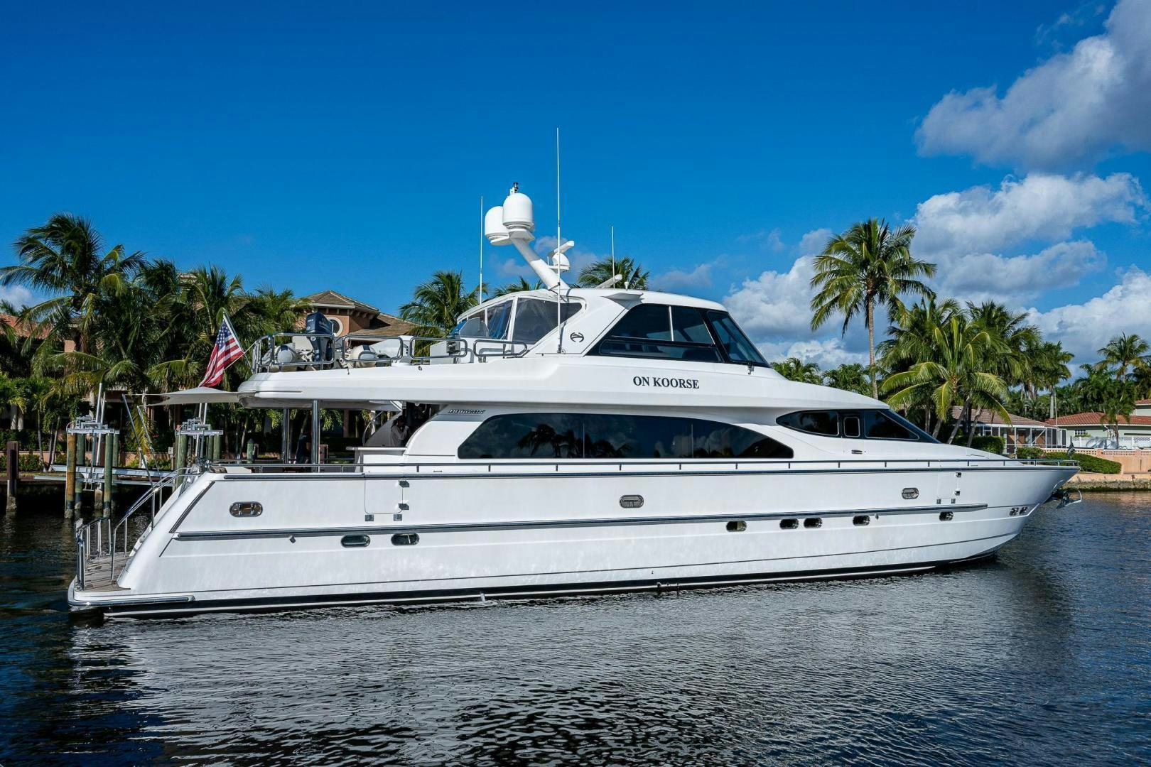 a white yacht on the water aboard ODYSSEY Yacht for Sale