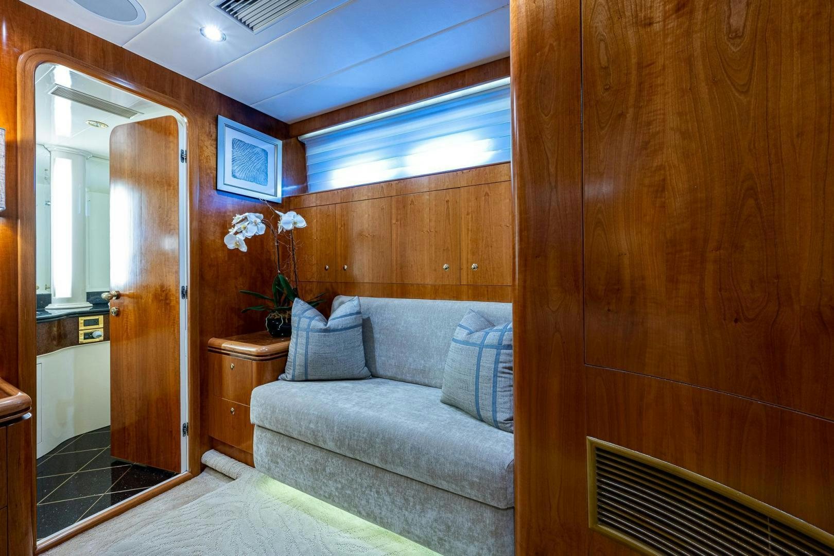a room with a couch and a door aboard ODYSSEY Yacht for Sale