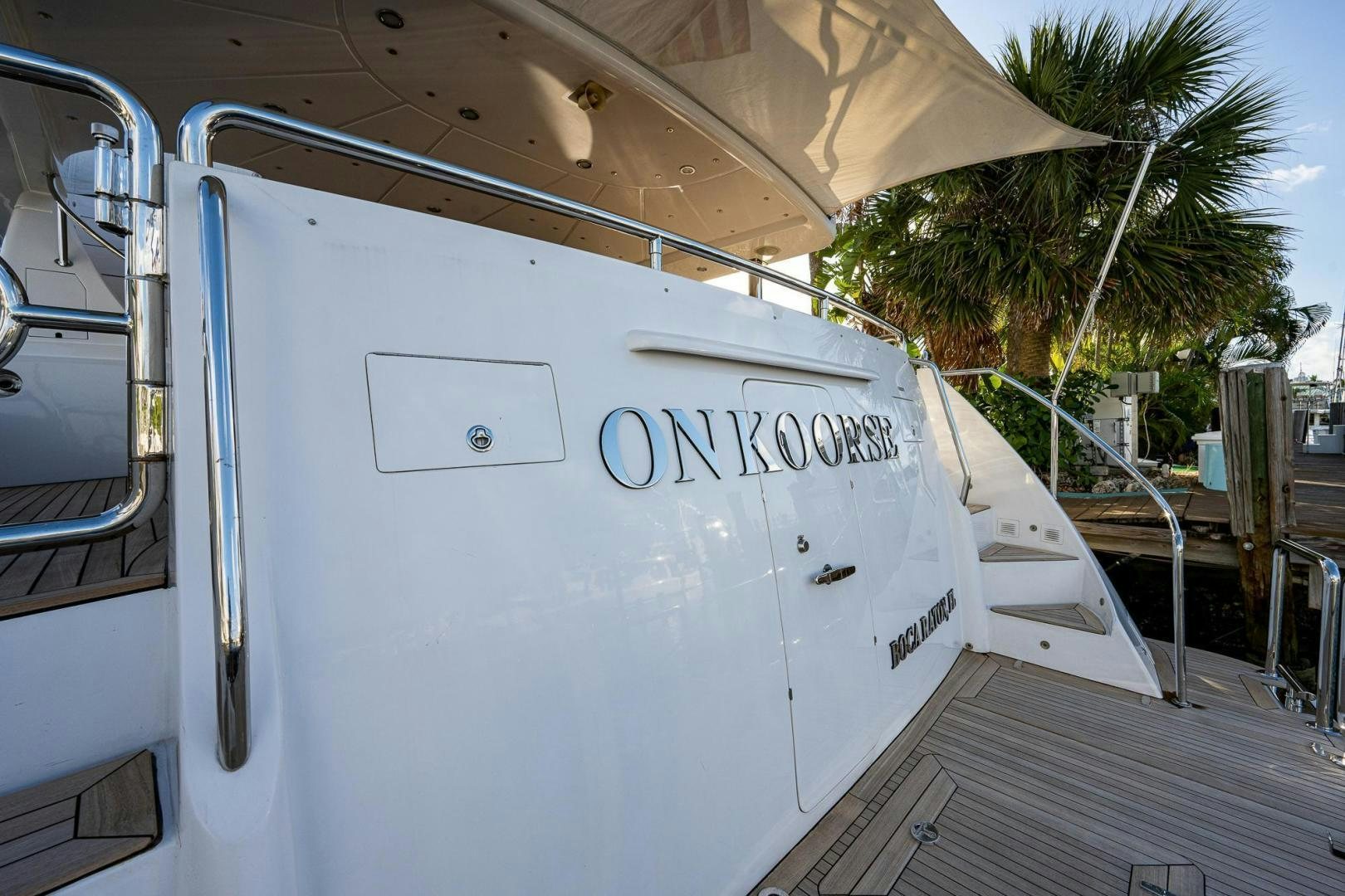 a white truck with a sign on the side aboard ODYSSEY Yacht for Sale