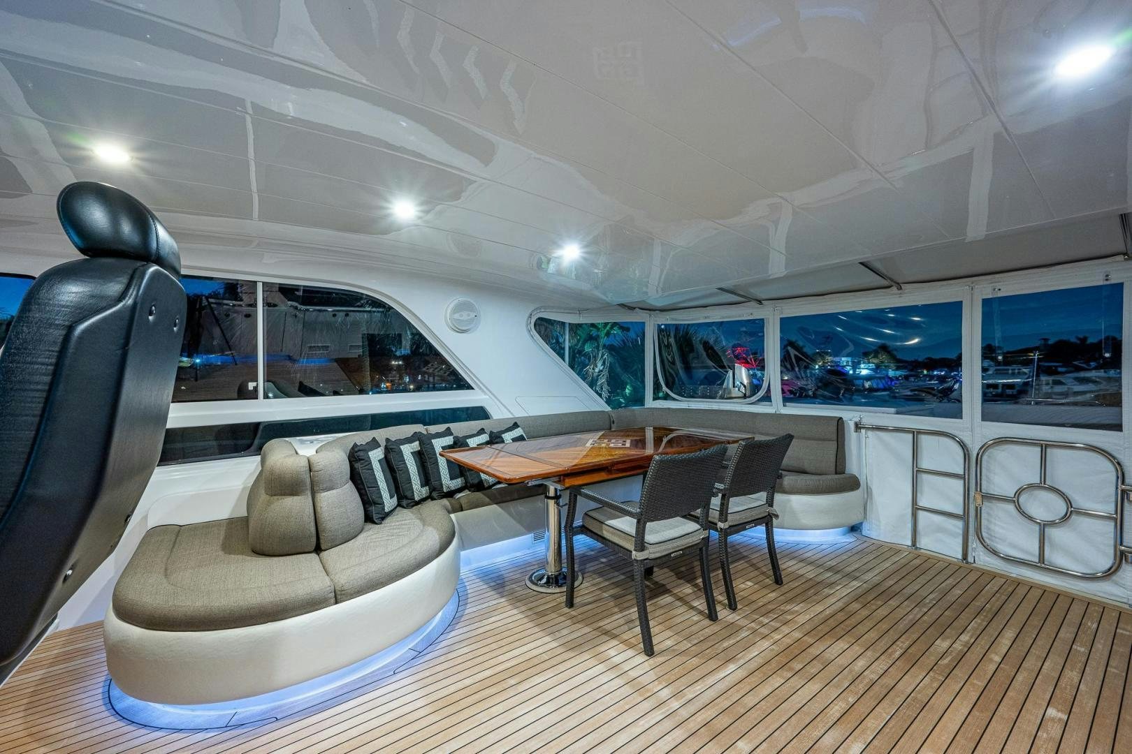 a room with a table and chairs aboard ODYSSEY Yacht for Sale