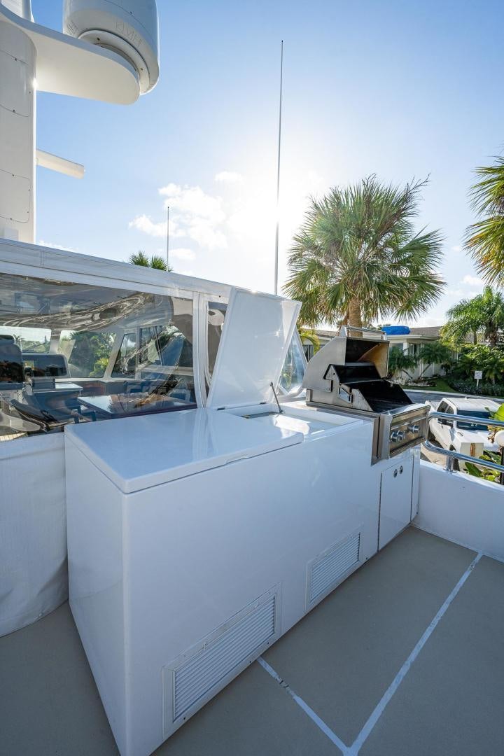 a white building with a large window aboard ODYSSEY Yacht for Sale