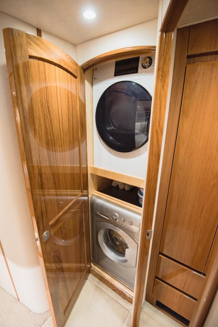 a washer and dryer in a room aboard C STUDENT Yacht for Sale