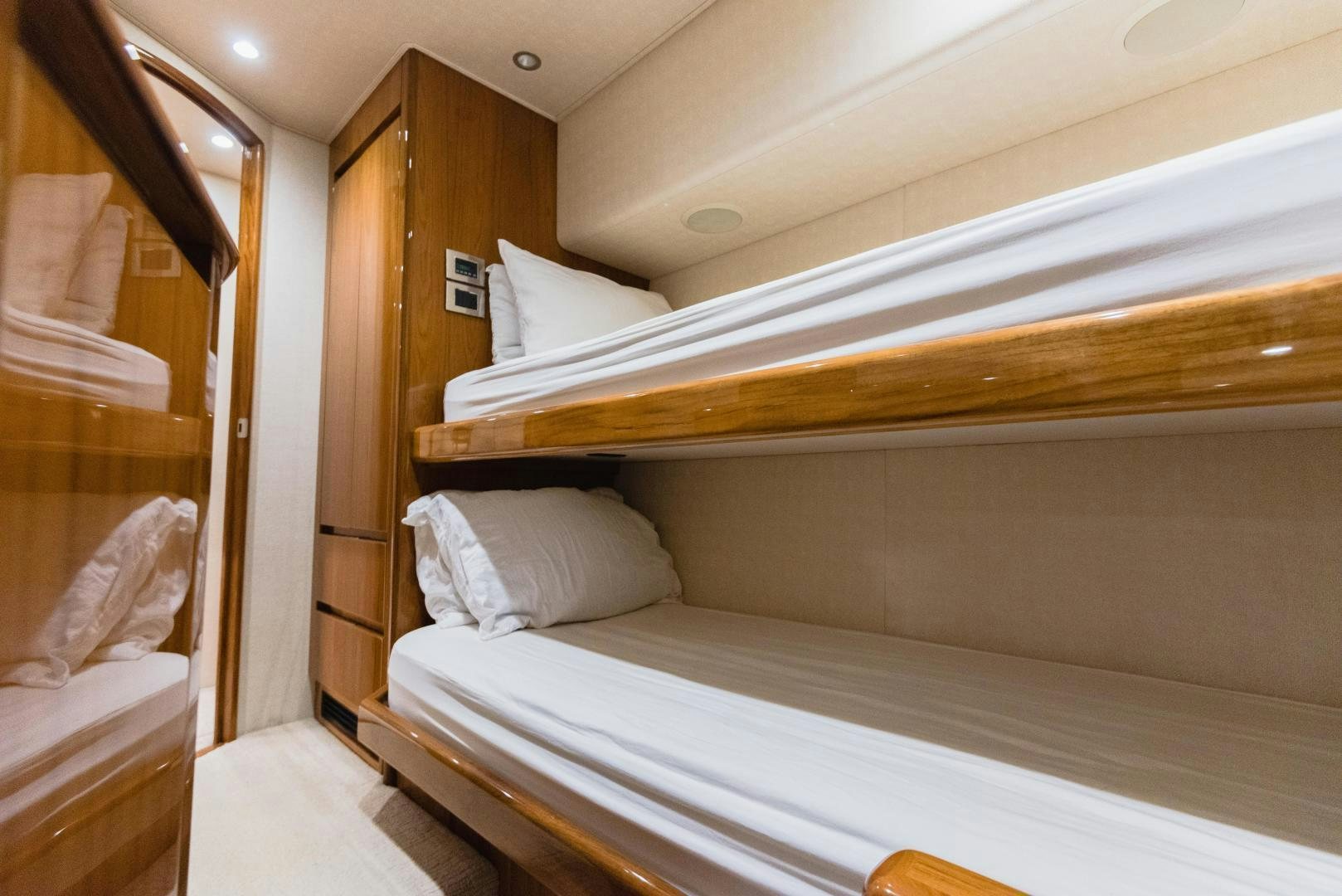 a room with a bed and a mirror aboard C STUDENT Yacht for Sale