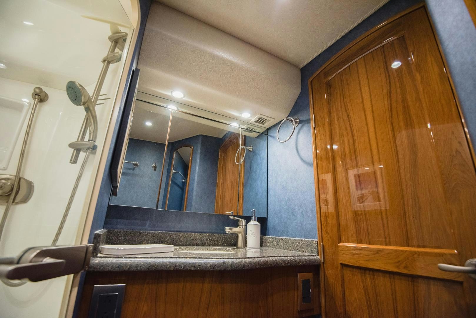 a bathroom with a sink and a mirror aboard C STUDENT Yacht for Sale