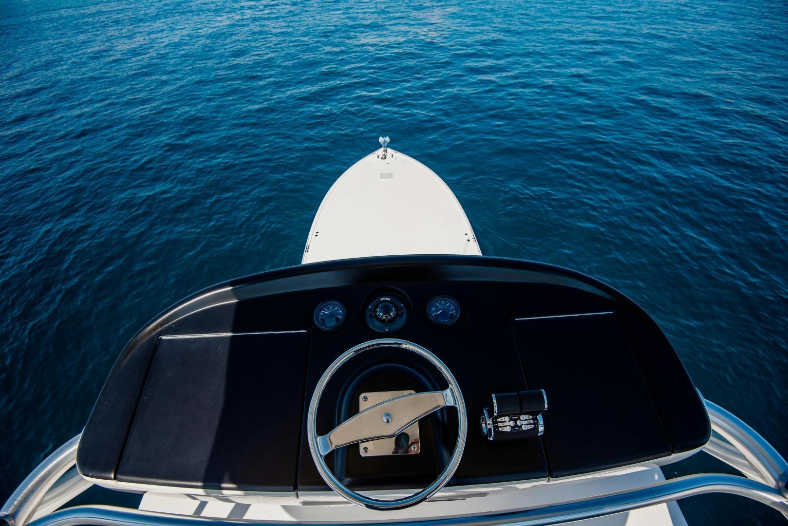 the steering wheel and dashboard of a car aboard C STUDENT Yacht for Sale