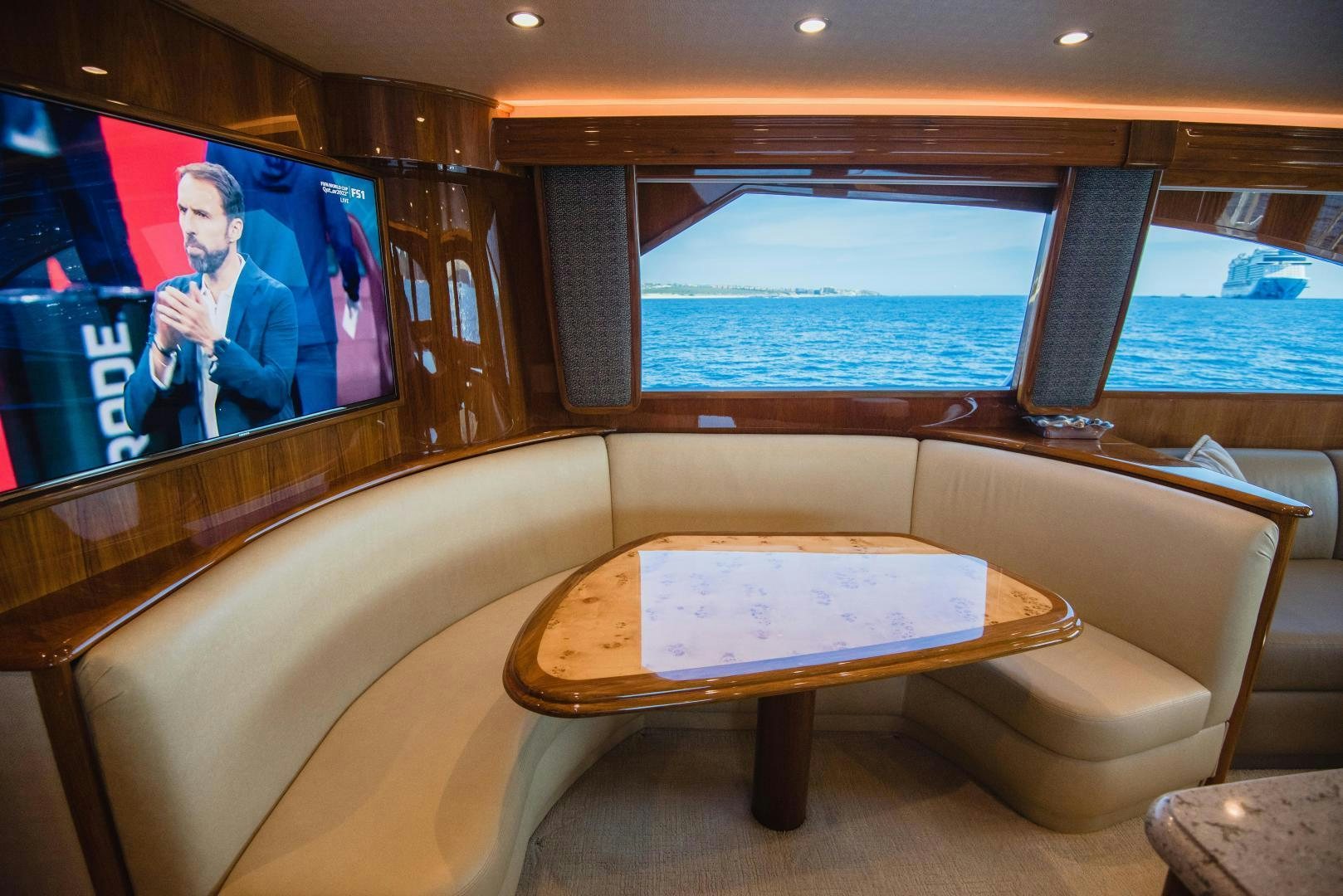 a room with a tv and a bench aboard C STUDENT Yacht for Sale