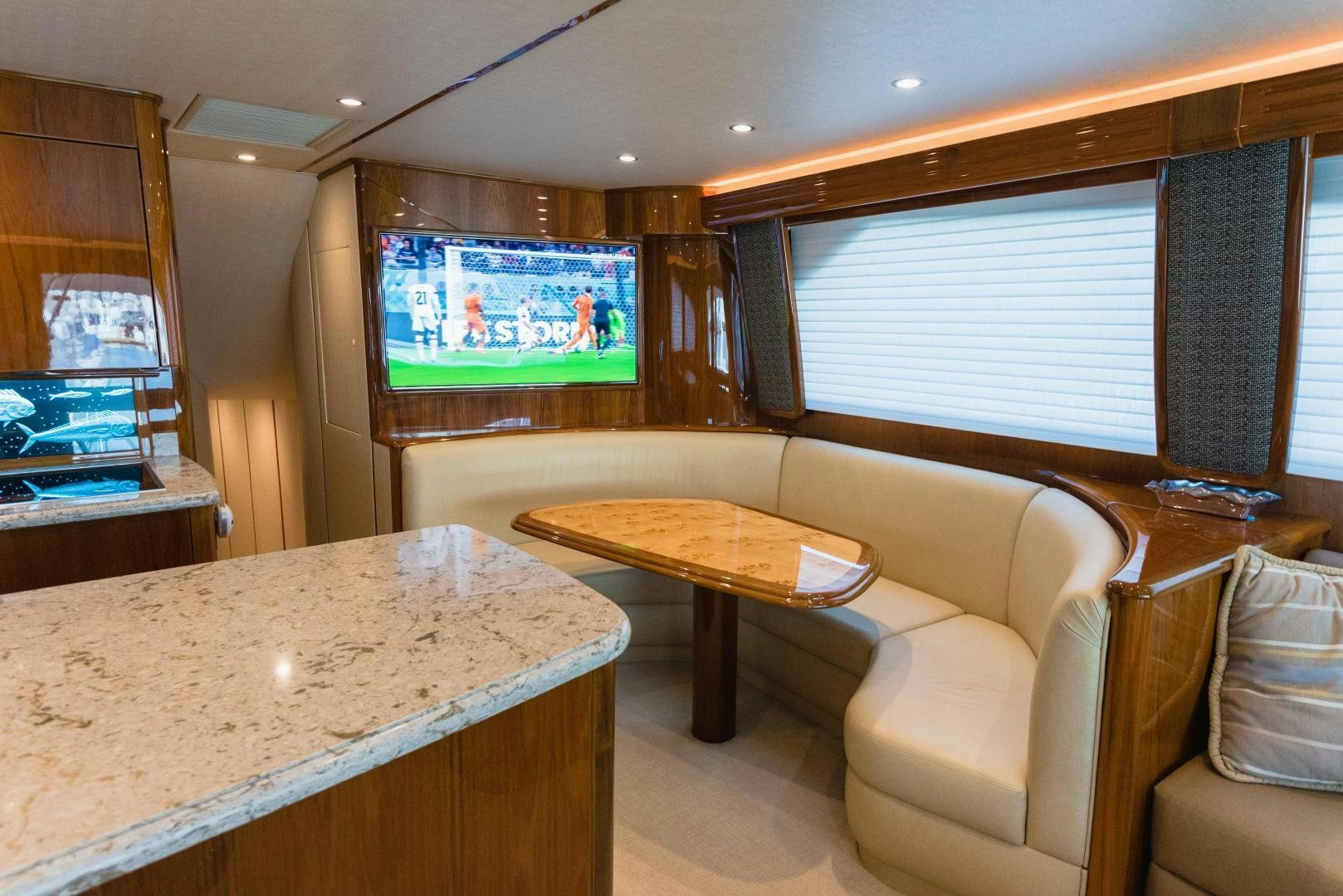 a living room with a table and chairs aboard C STUDENT Yacht for Sale