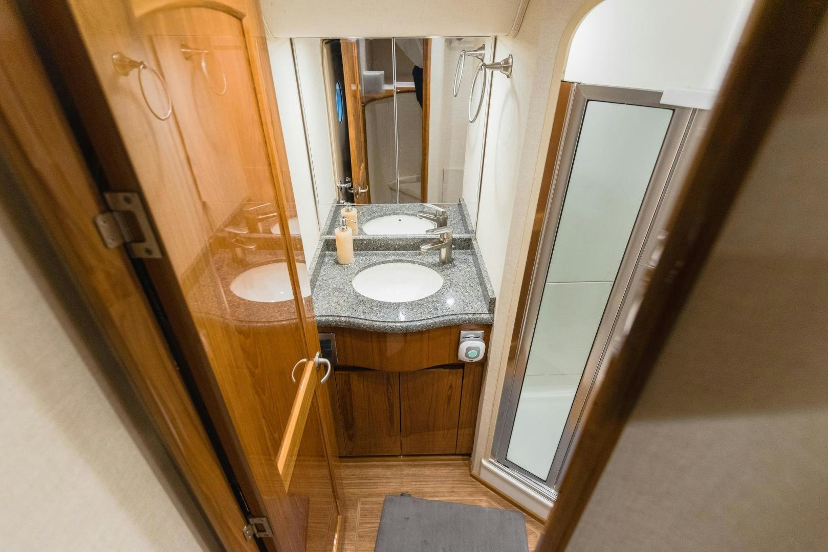 a bathroom with a sink and a mirror aboard C STUDENT Yacht for Sale