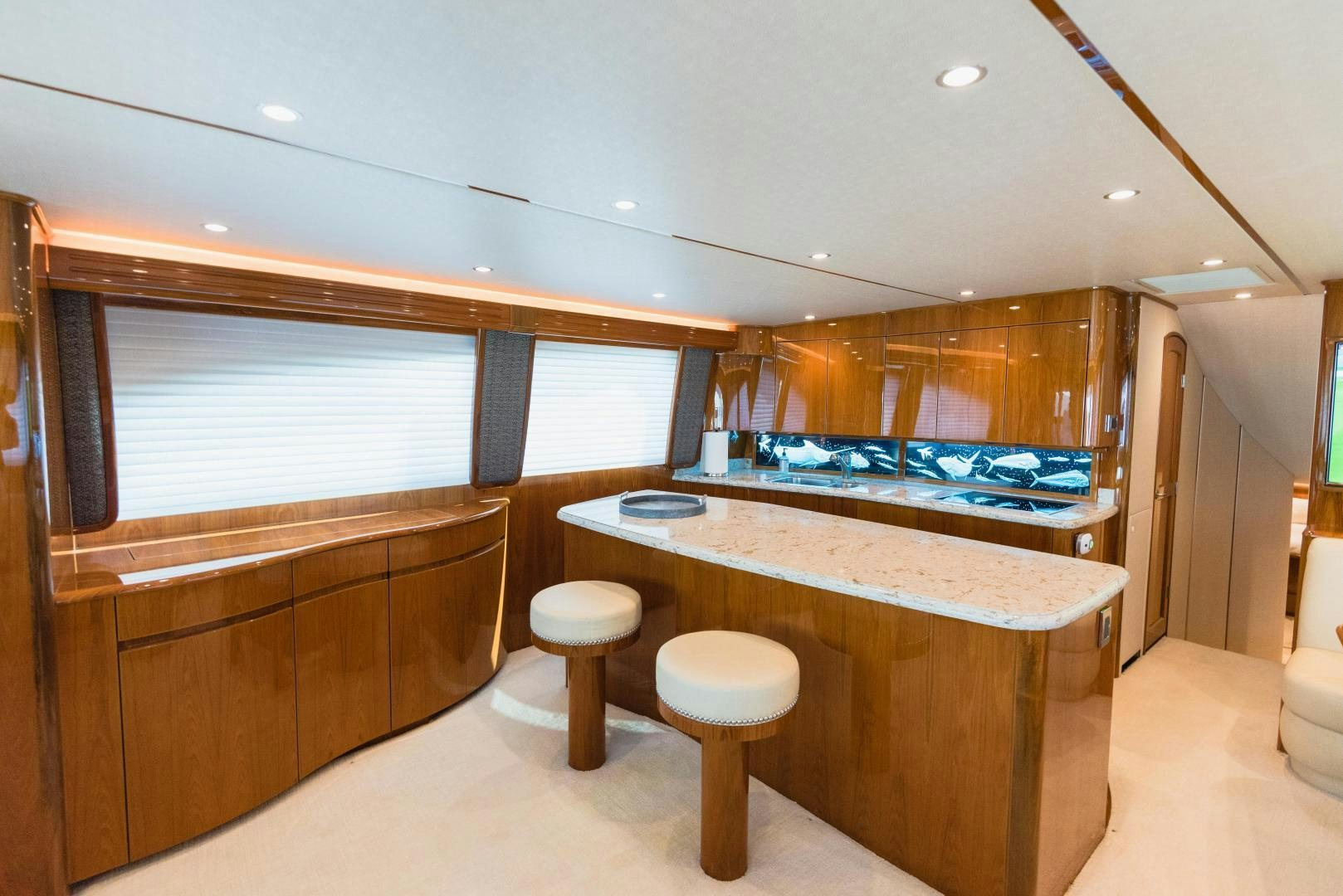 a bathroom with a countertop sink and stools aboard C STUDENT Yacht for Sale