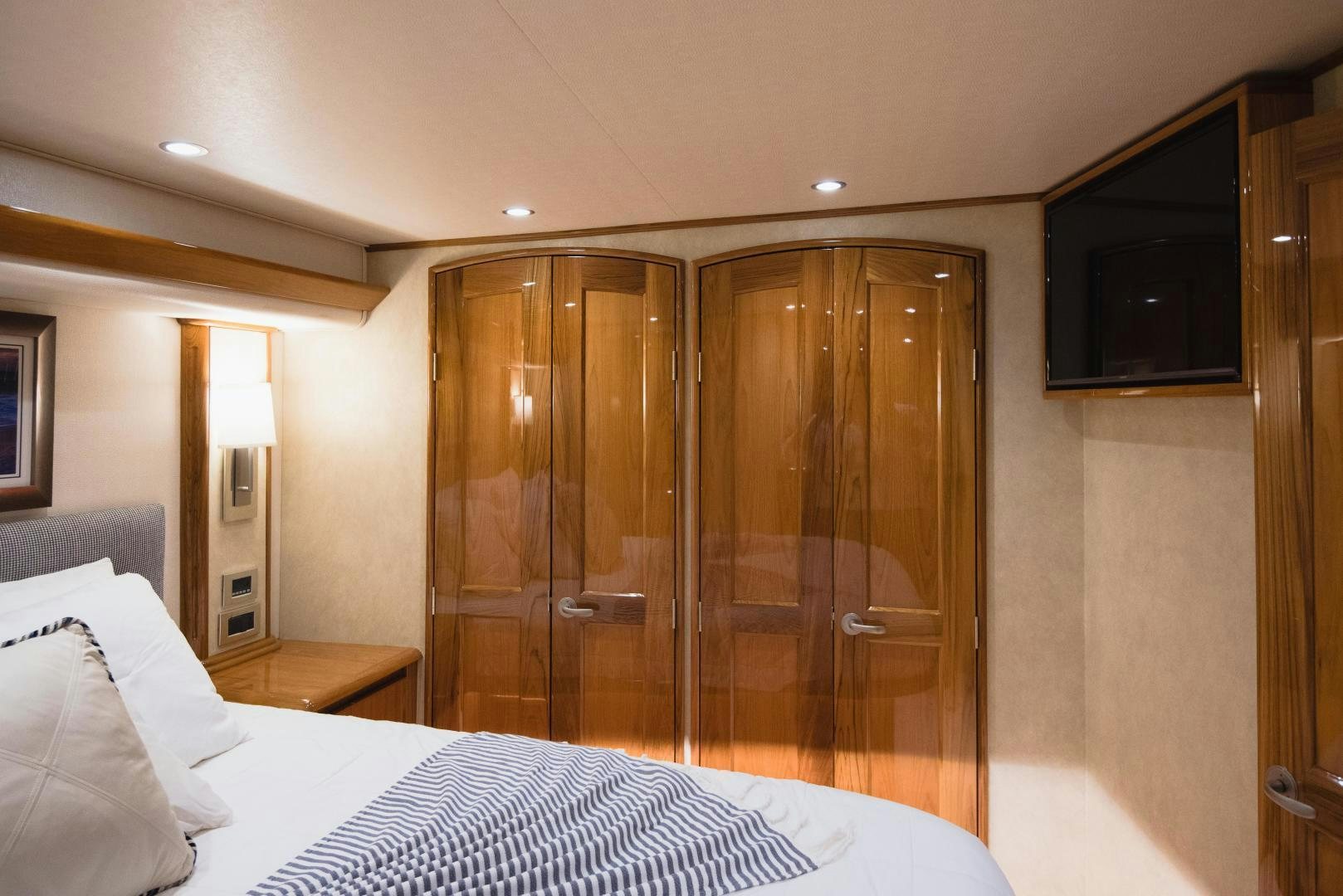 a hotel room with a bed and a closet aboard C STUDENT Yacht for Sale