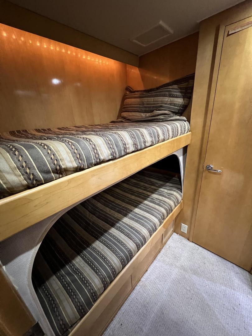 a bed with a mattress aboard LUCKY JOE Yacht for Sale