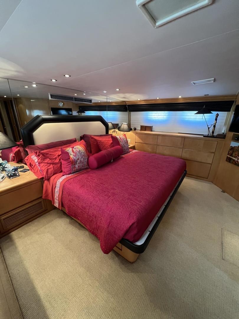 a bed in a room aboard LUCKY JOE Yacht for Sale