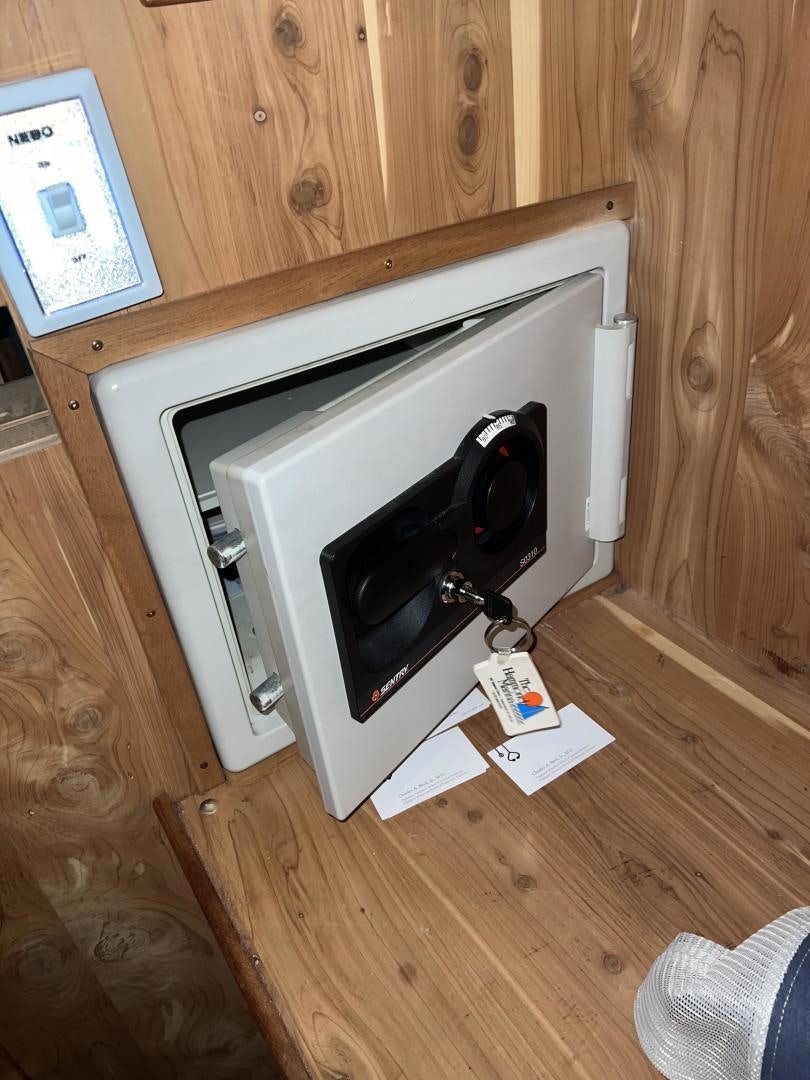 a white and black electronic device aboard LUCKY JOE Yacht for Sale