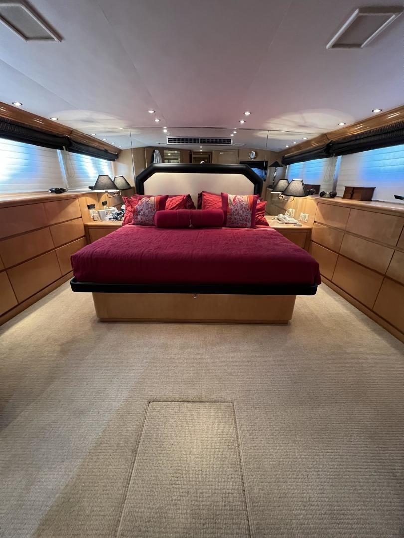 a bed in a room aboard LUCKY JOE Yacht for Sale