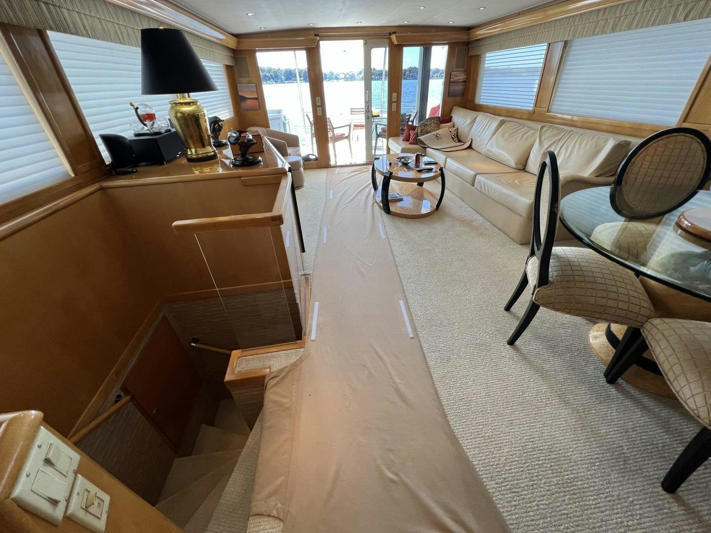 a room with a couch and a desk aboard LUCKY JOE Yacht for Sale