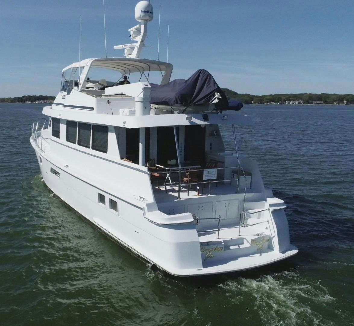 a boat with a person on it aboard LUCKY JOE Yacht for Sale