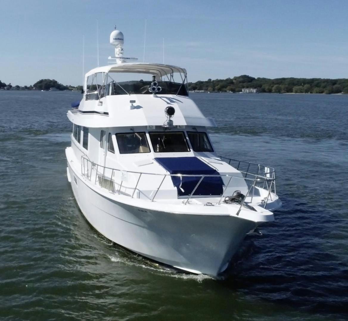 a white boat on the water aboard LUCKY JOE Yacht for Sale