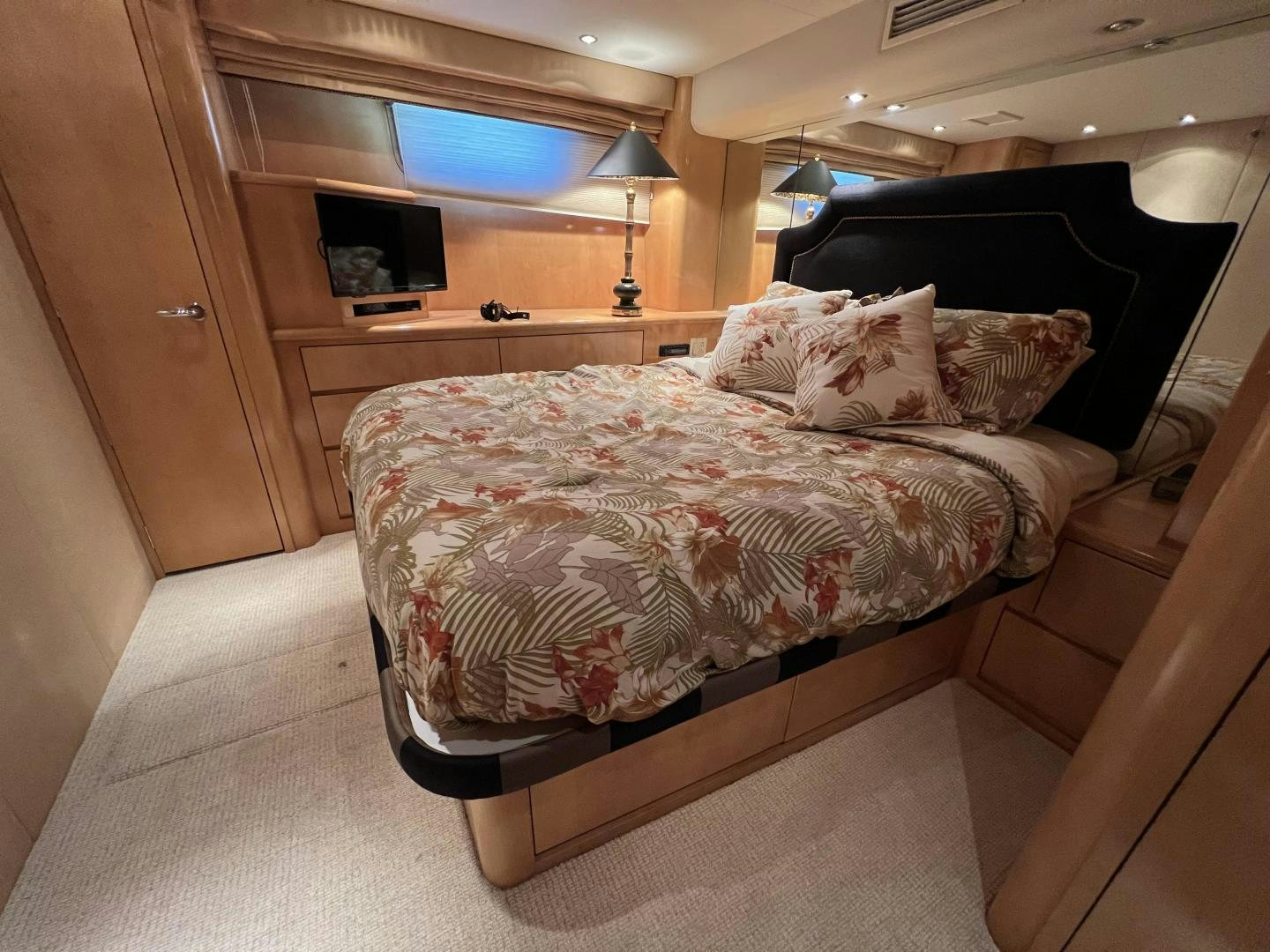 a bed in a room aboard LUCKY JOE Yacht for Sale