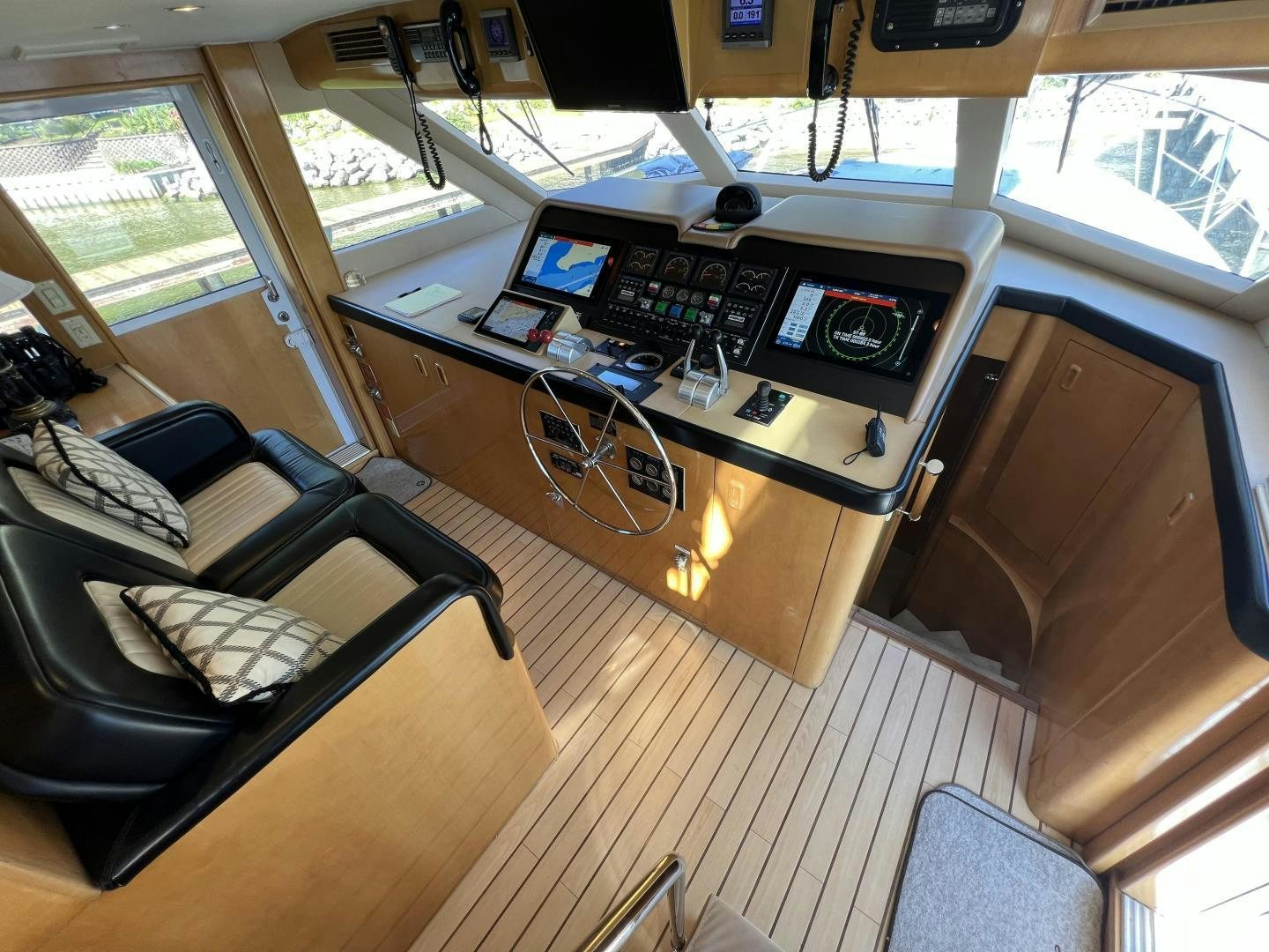 a boat with a desk and computer aboard LUCKY JOE Yacht for Sale