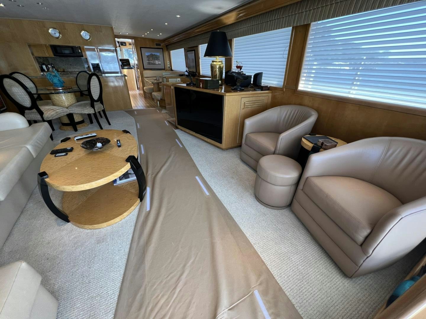 a large living room with a large window aboard LUCKY JOE Yacht for Sale