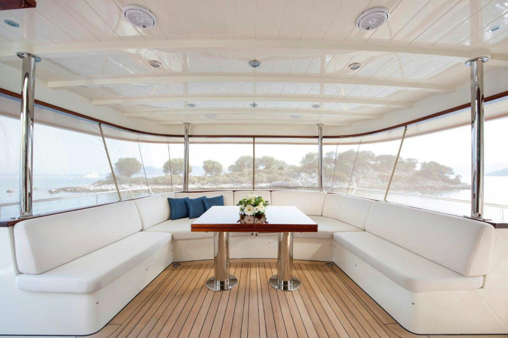 a living room with a large window aboard MAGNOLIA ONE Yacht for Sale