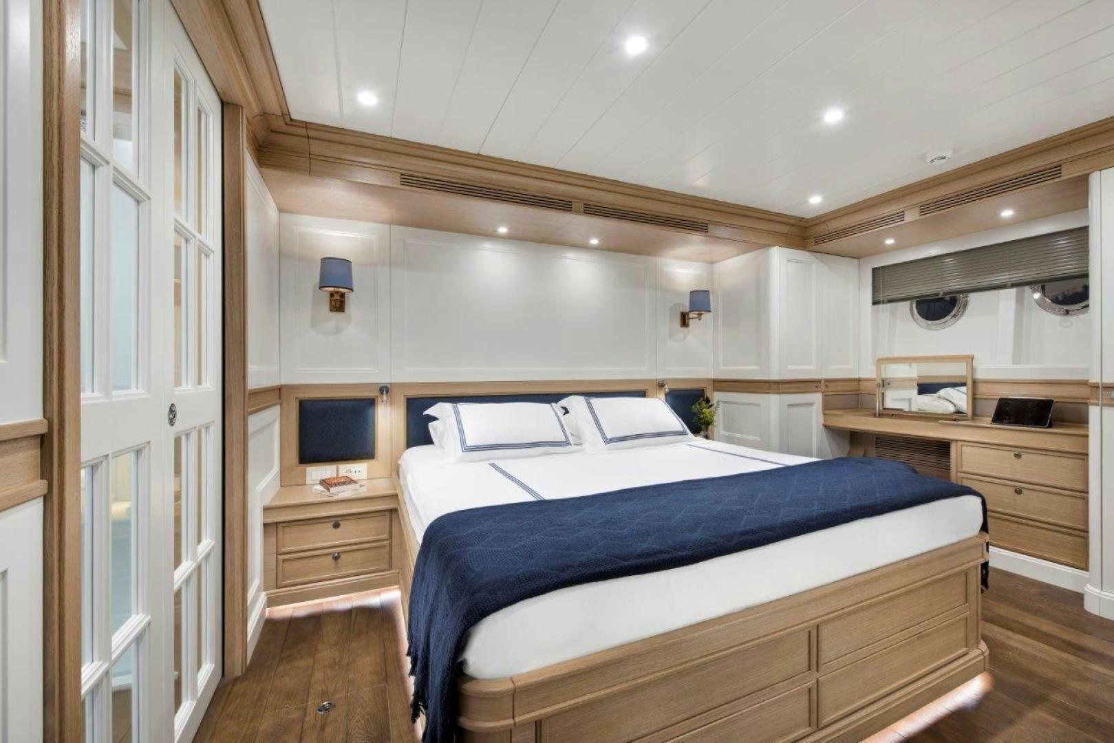 a bedroom with a bed aboard MAGNOLIA ONE Yacht for Sale