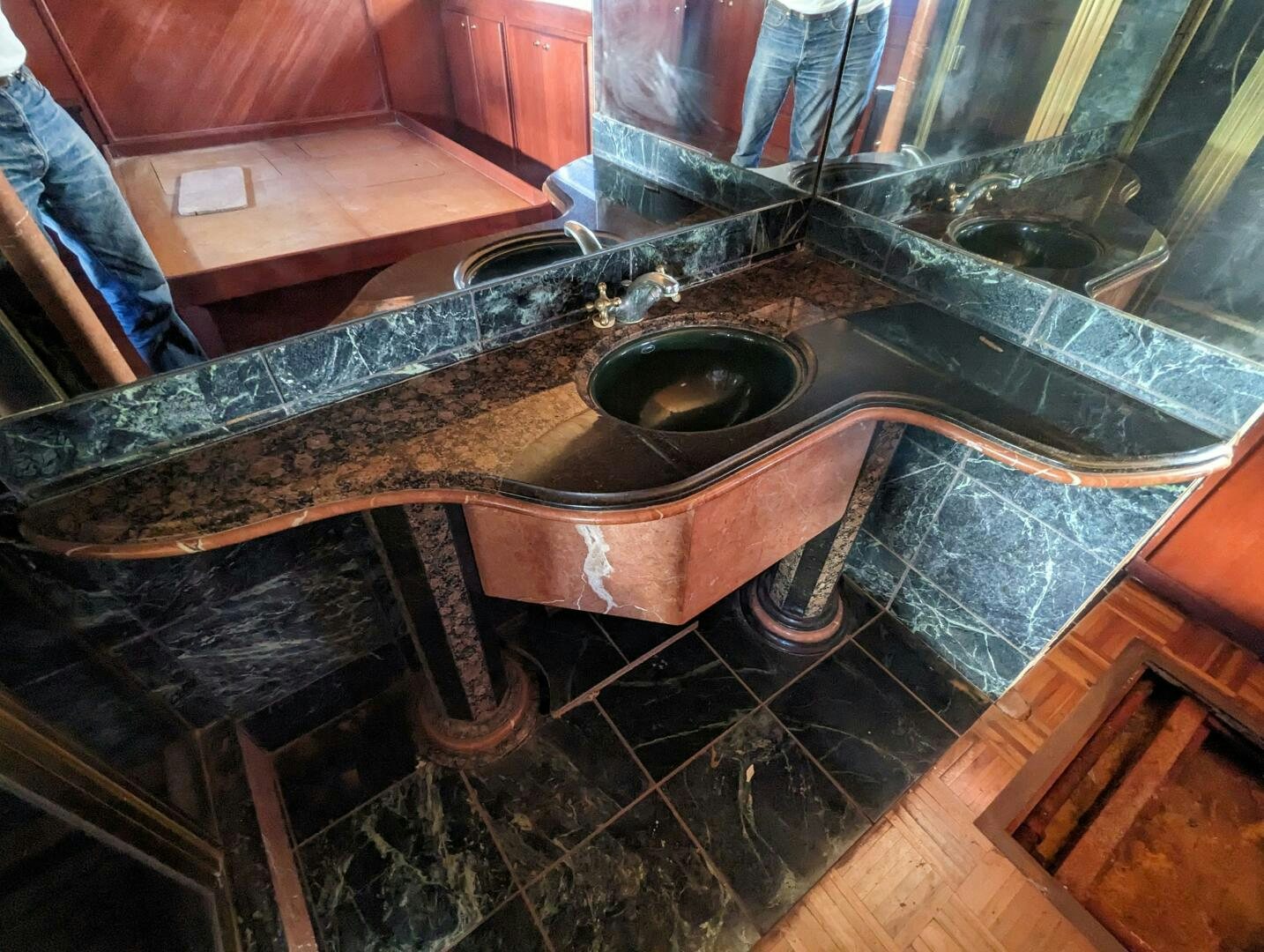 a metal contraption on a wooden surface aboard ISABELLA Yacht for Sale