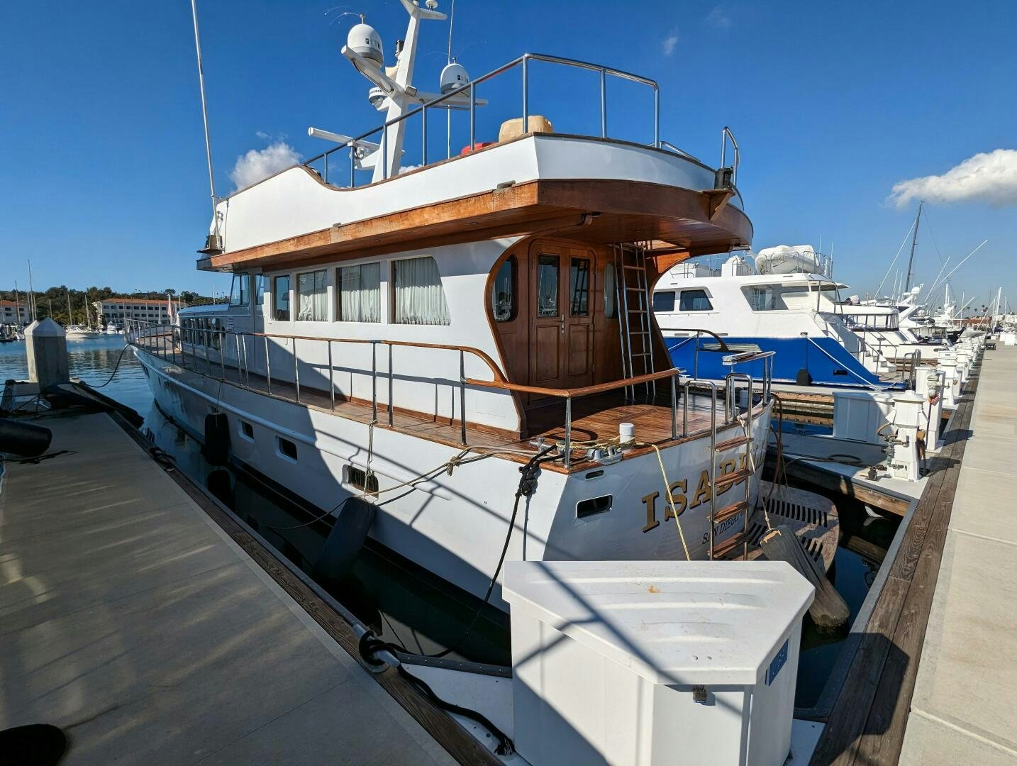 a large boat docked at a pier aboard ISABELLA Yacht for Sale