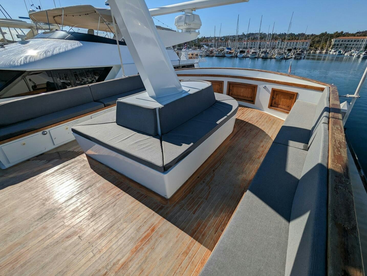 a deck with a large white boat on it aboard ISABELLA Yacht for Sale