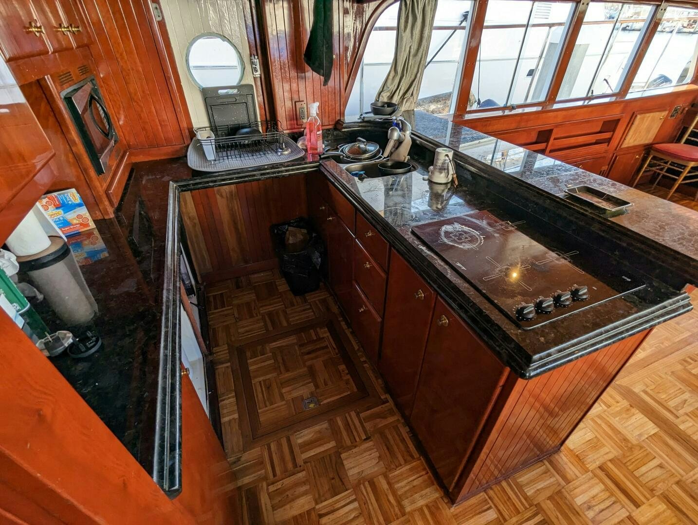 a kitchen with a sink and a counter aboard ISABELLA Yacht for Sale