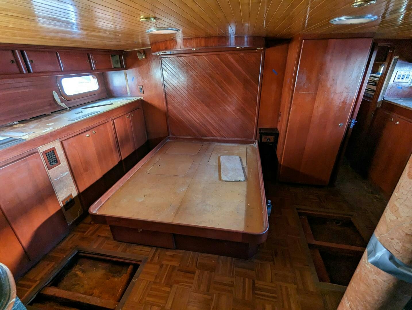 a kitchen with wooden cabinets aboard ISABELLA Yacht for Sale