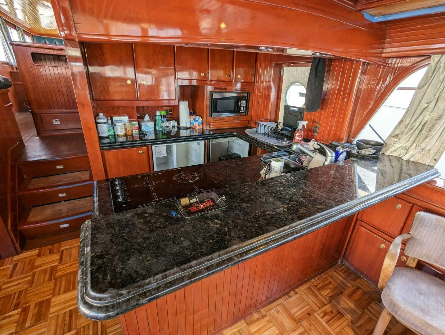a kitchen with a bar and a bar aboard ISABELLA Yacht for Sale