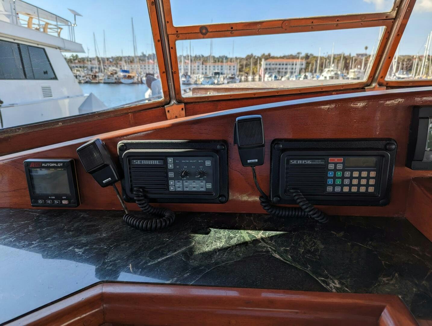 a group of telephones on a table aboard ISABELLA Yacht for Sale